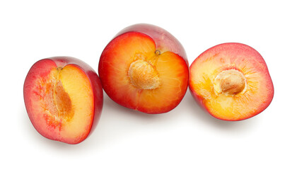 Fototapeta na wymiar Cut plums isolated on white background