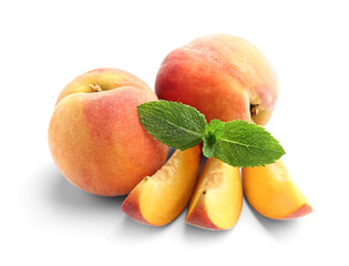 Sweet ripe peaches on white background