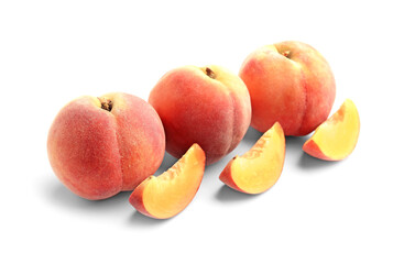 Sweet ripe peaches on white background