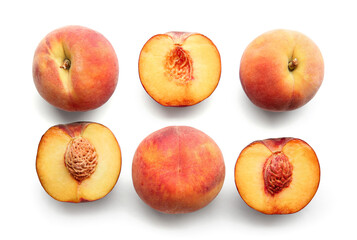 Sweet ripe peaches on white background
