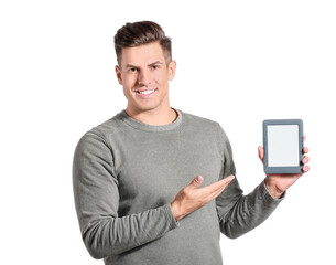 Young man with e-reader on white background