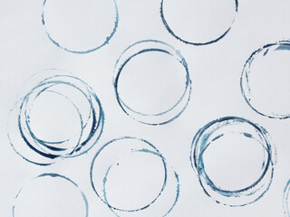 blue shapes of Wine circle and Coffee ring stains. Wine glass marks or coffee cup round stains and dirty splashes and spots isolated. Hand drawn tea or ink ring stains on white background
