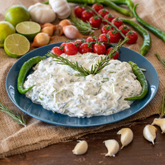 Purslane salad with yoghurt appetizer healthy meals - tomato, pepper, garlic turkish cuisine dishes