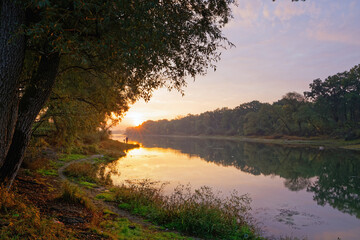 landscape red sun rises over the river