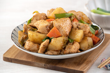 Homemade delicious cubed chicken with braised potato chunks.