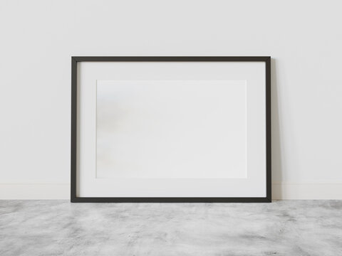 Black frame leaning on floor in interior mockup. Template of a picture framed on a wall 3D rendering