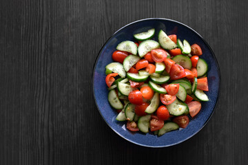 Cucumber and tomato salad. Healthy and dietary food. Weight loss program meal.