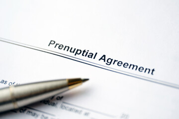 Legal document Prenuptial Agreement on paper near pen