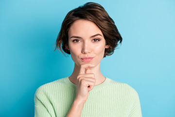 Portrait of pretty thinking short hairdo girl hand chin wear lime sweater isolated on teal color background