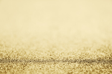 Fototapeta na wymiar Abstract gold glitter sparkle blurred with bokeh background