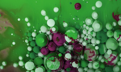 Abstract blurred background with colorful gradient colors. Oil drops in water abstract psychedelic image pattern.