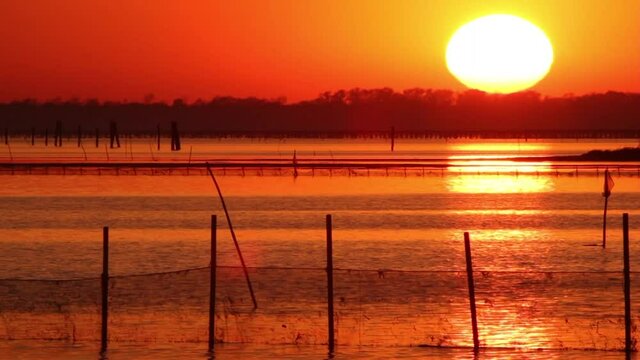 sunset over the po goro delta regional park
