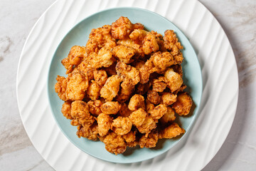 Popcorn chicken - american fast food on a plate