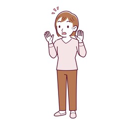 ピンクの長袖の若い女性