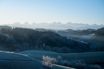 Bernese Alps and the hills of Emmental on a winter morning