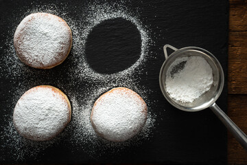 Traditional German fried donuts with no hole, so called Krapfen or 