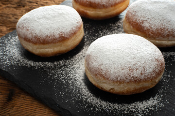 Traditional German fried donuts with no hole, so called Krapfen or 