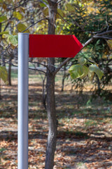 Red road road sign arrow with empty space for text vertical