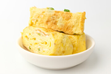 Egg rolls on white background