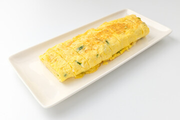 Egg rolls on white background