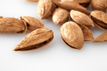 Almonds are the kernel of the nut was lying on a white background.Space for text