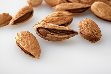 Almonds are the kernel of the nut was lying on a white background.Space for text