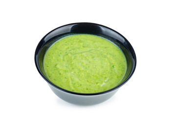 Ceramic bowl with Broccoli cream-soup isolated on white background