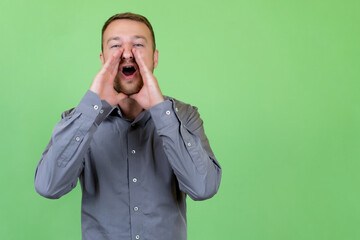 Shouting british man with beard and copy space