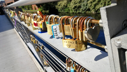 Locks of love on a bridge in Birmingham UK, close-up, focus