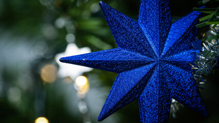 A blue star Christmas tree decoration