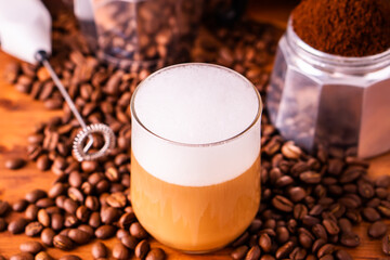 Fresh cafe for refresh caffeine white cup roasted organic coffee bean farm in vintage wood grinder classic metal coffee pot for black espresso and glass cream foam milk cappuccino latte