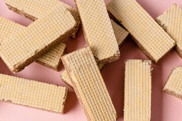 Chocolate waffles on a pink background