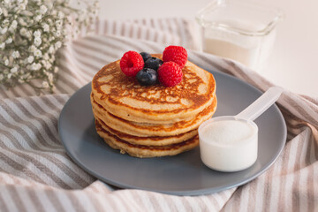 Collagen powder recipes concept. Pancakes made with collagen or protein  powder. Perfect tasty and healthy breakfast. Beauty supplements for skin and bones.