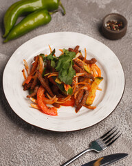 Asian cuisine. Vegetable snacks. Salad with meat. Traditional Chinese and Korean cuisine