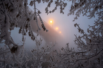 Bridge over the Angara in winter fog