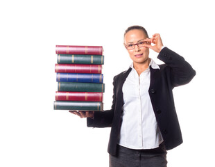 Attractive smiling adult woman as a teacher in formal wear and eyeglasses with a stack of books in a hand, isolated on white.