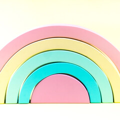 wooden rainbow of pastel colors