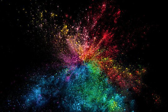 Explosion of colour powder isolated on black background. Abstract colour background © zhikun sun