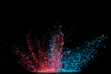 Explosion of colour powder isolated on black background. Abstract colour background