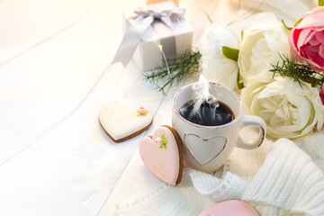 Valentine's day romantic breakfast wuth gingerbread Heart with icing and cup of coffe