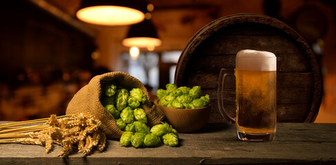 Glass beer on wood background with copyspace