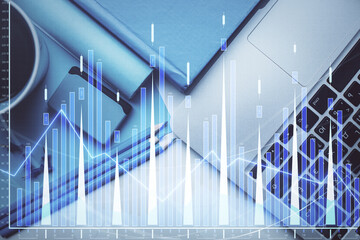 Fototapeta premium Double exposure of forex graph drawing over desktop background with computer. Concept of financial analysis. Top view.