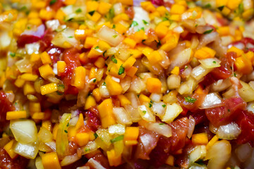 Close-up texture of minced lamb meat with vegetables. Eastern cuisine: lamb, pumpkin, onions and spices. Filling for manti with pumpkin. Delicious and juicy minced meat for the pie.
