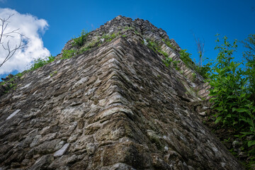 Fototapeta na wymiar Details of Ichkabal pyramid. Mayan archeological site. Hidden pyramid. Uncovered pyramid.
