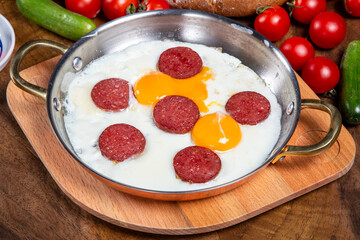 Turkish Breakfast with sausage and egg fried.