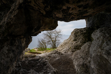 Naklejka premium Cave entrance with ocean view, Long exposure