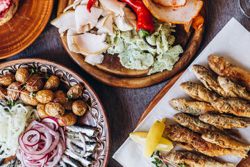 delicious European and Slavic cuisine on the big table waiting for guests. table with food, top view