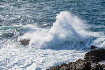 日本海の荒波と柱状節理の岩礁　島根県出雲市大社町　The raging waves of the Sea of Japan and column pillar   rocks