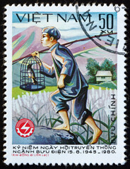 Postage stamp Vietnam 1980 Kim Dong carrying bird in cage