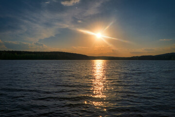 Picturesque summer landscape with riverbank at sunset. Wonderful nature, beautiful natural background.